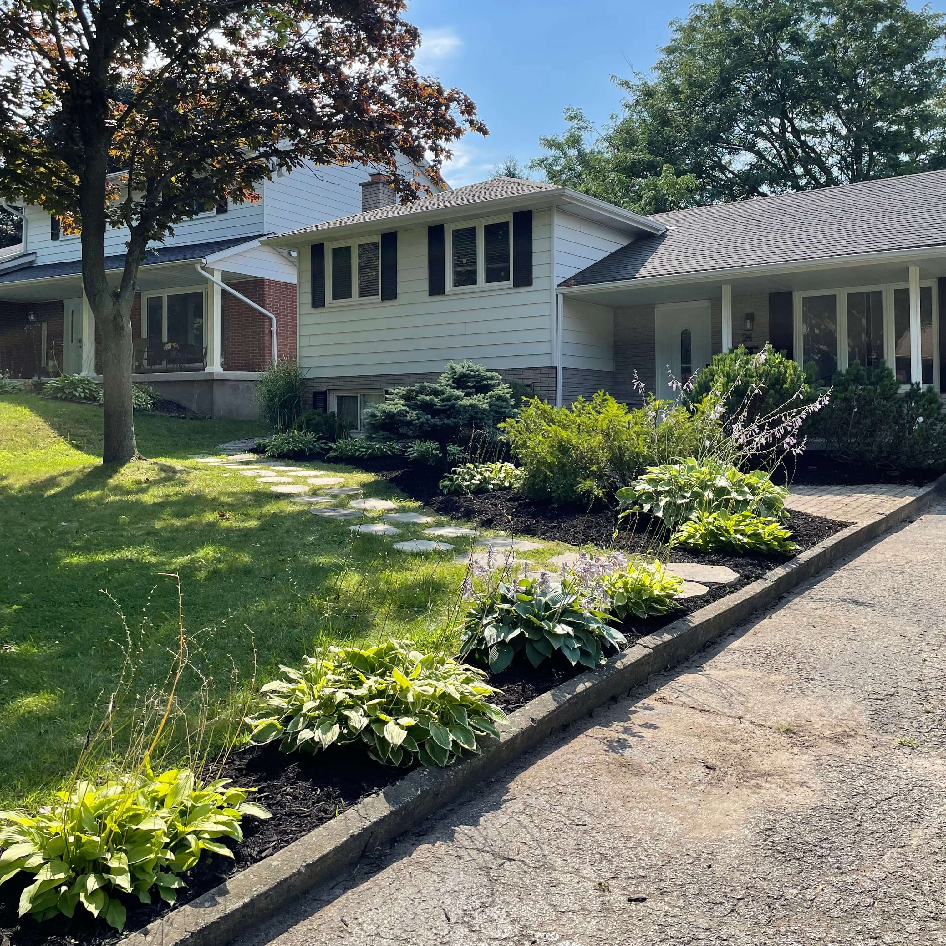 Professional mulch delivery and installation service in Norfolk County by RYD Landscaping